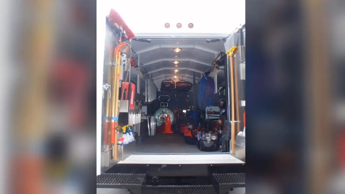 Open plumbing service van stocked with tools and equipment for plumbing service in Laguna Niguel